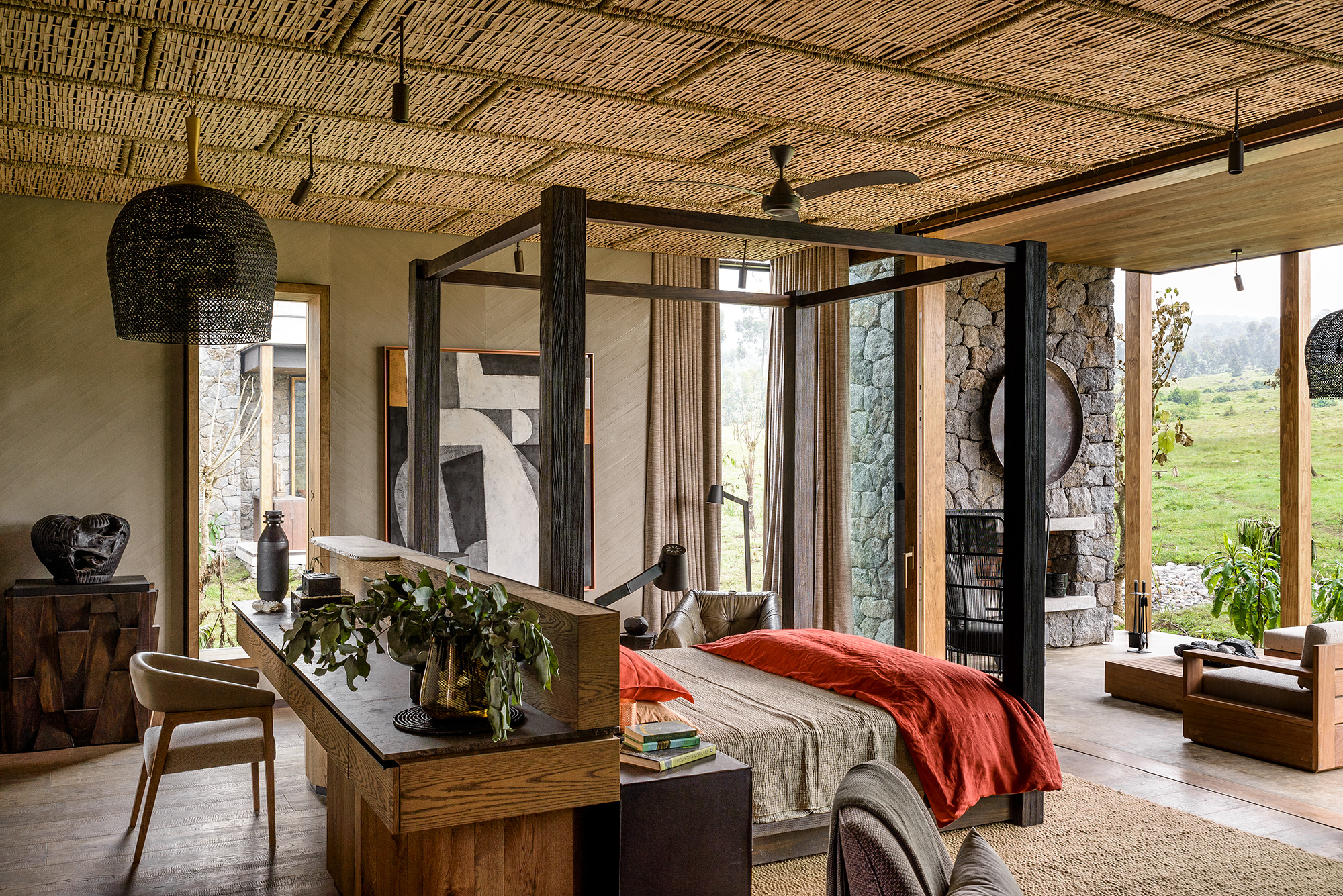 resort bedroom showing a desk and bed